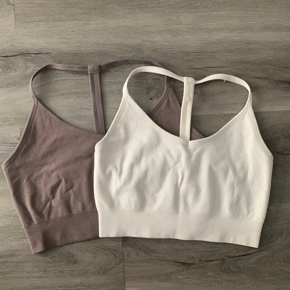 Two white and purple athletic cropped tank tops. - Picture 1 of 5